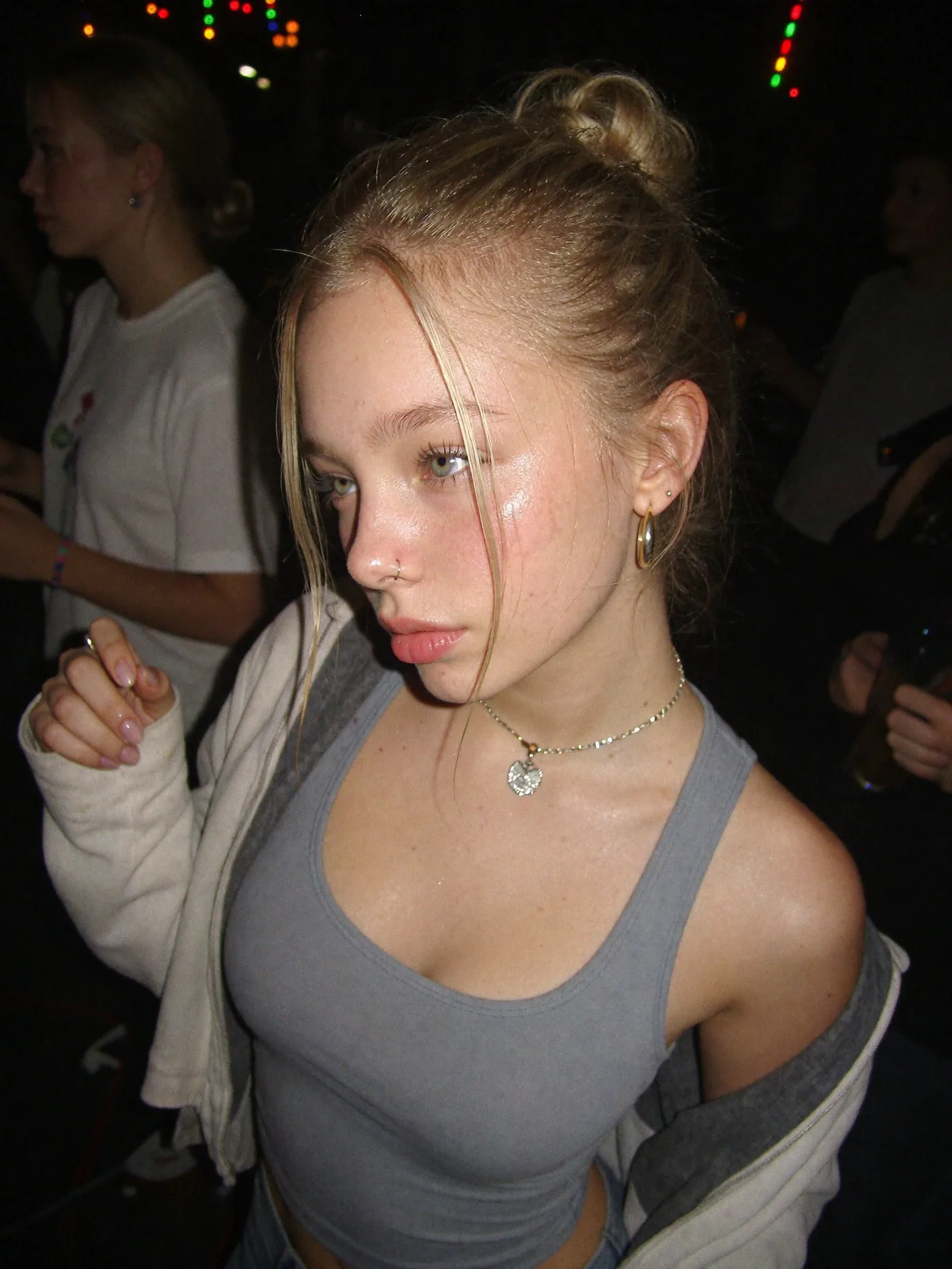 Candid flash portrait on a crowded club night