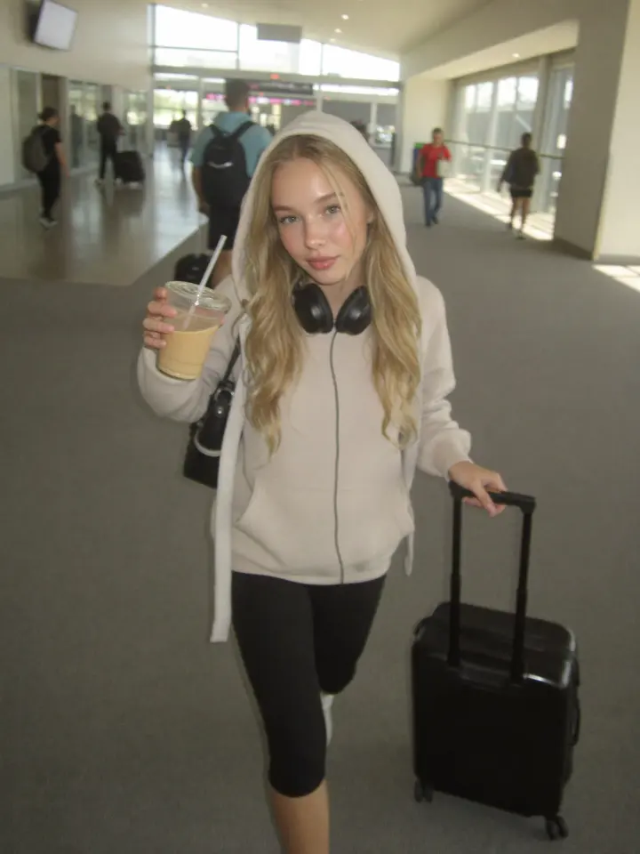 AI influencer example generated from the Airport terminal walk prompt